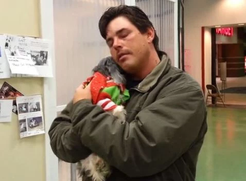 Man reuinted with Dog Man reuinted with Dog